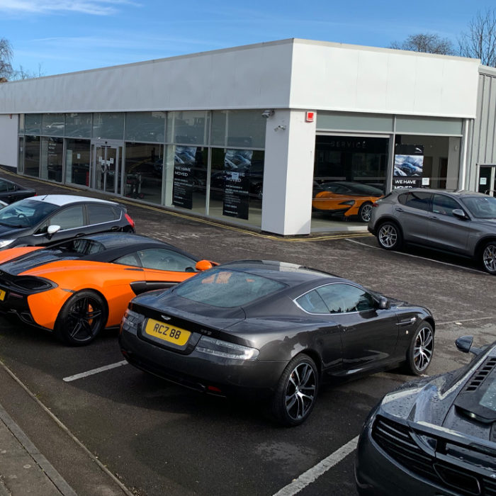 Camclad Contractors Ltd, Cambridge - Aston Martin Dealership - Over Cladding - Euroclad Approved Installer - Cladding Contractor